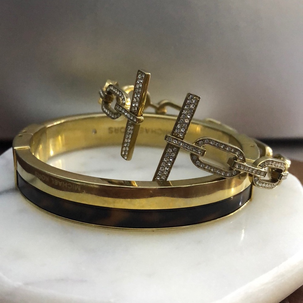 Two Michael kors bangels